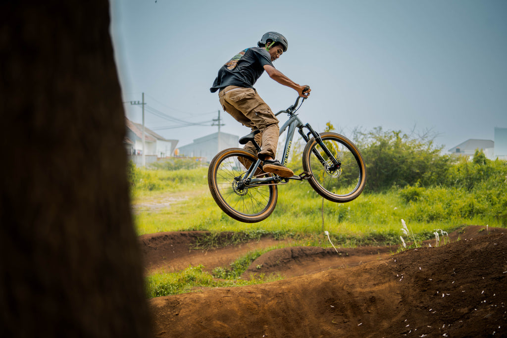 Jumping On A Bike 2023 Specialized Series Dirt Jump Bike Satin Red