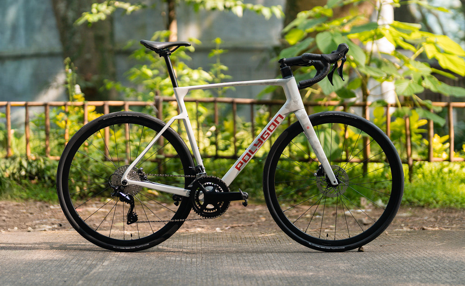 Polygon Strattos 6 - Tiagra Carbon Enduran | BikesOnline.com